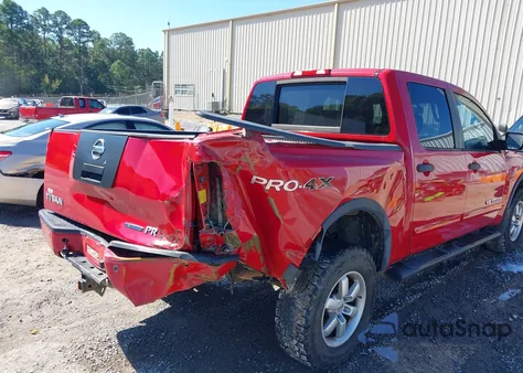 2012 Nissan Titan Pro-4X z USA, uszkodzony, nr VIN 1N6BA0EC6CN303152